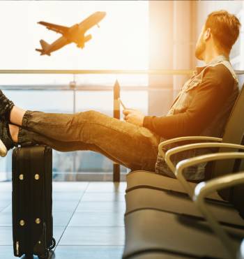 guy waiting in an airport